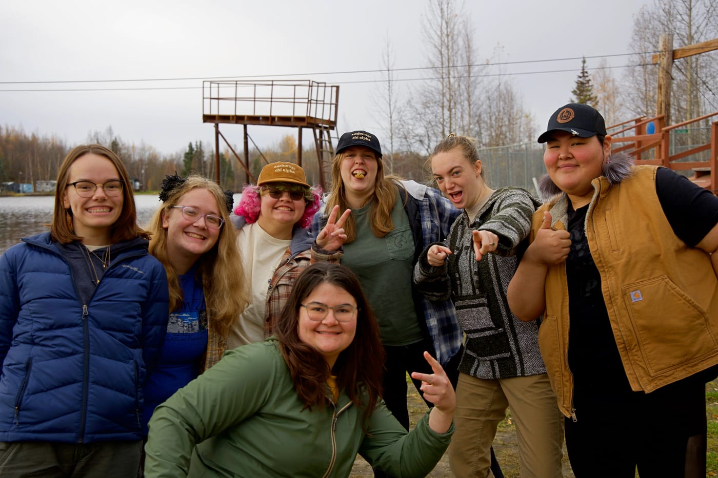 A group of Chi Alpha students outdoors, laughing together